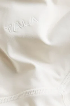 TALA Coffee Dates|Yoga / Pilates*DayFlex Contrast Stripe Side Split Flared Yoga Pant No Front Seam - Ivory And Shadow Black
